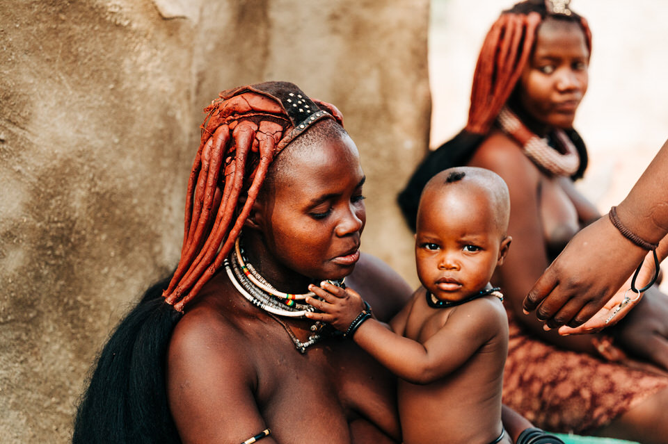Himba tribe cultural photography showing traditional African tribal life in Namibia desert - authentic cultural documentation by professional travel photographer